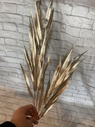 K metallic leaf spray